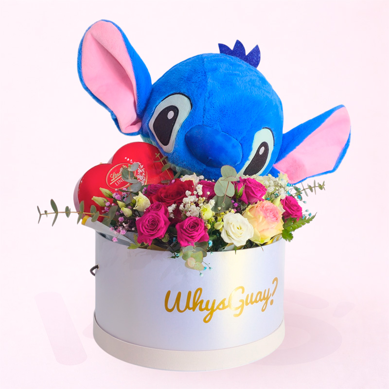 Caja de flores con rosas, chocolates y peluche de Stitch en caja decorativa